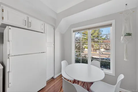 a view of a livingroom with furniture and a table