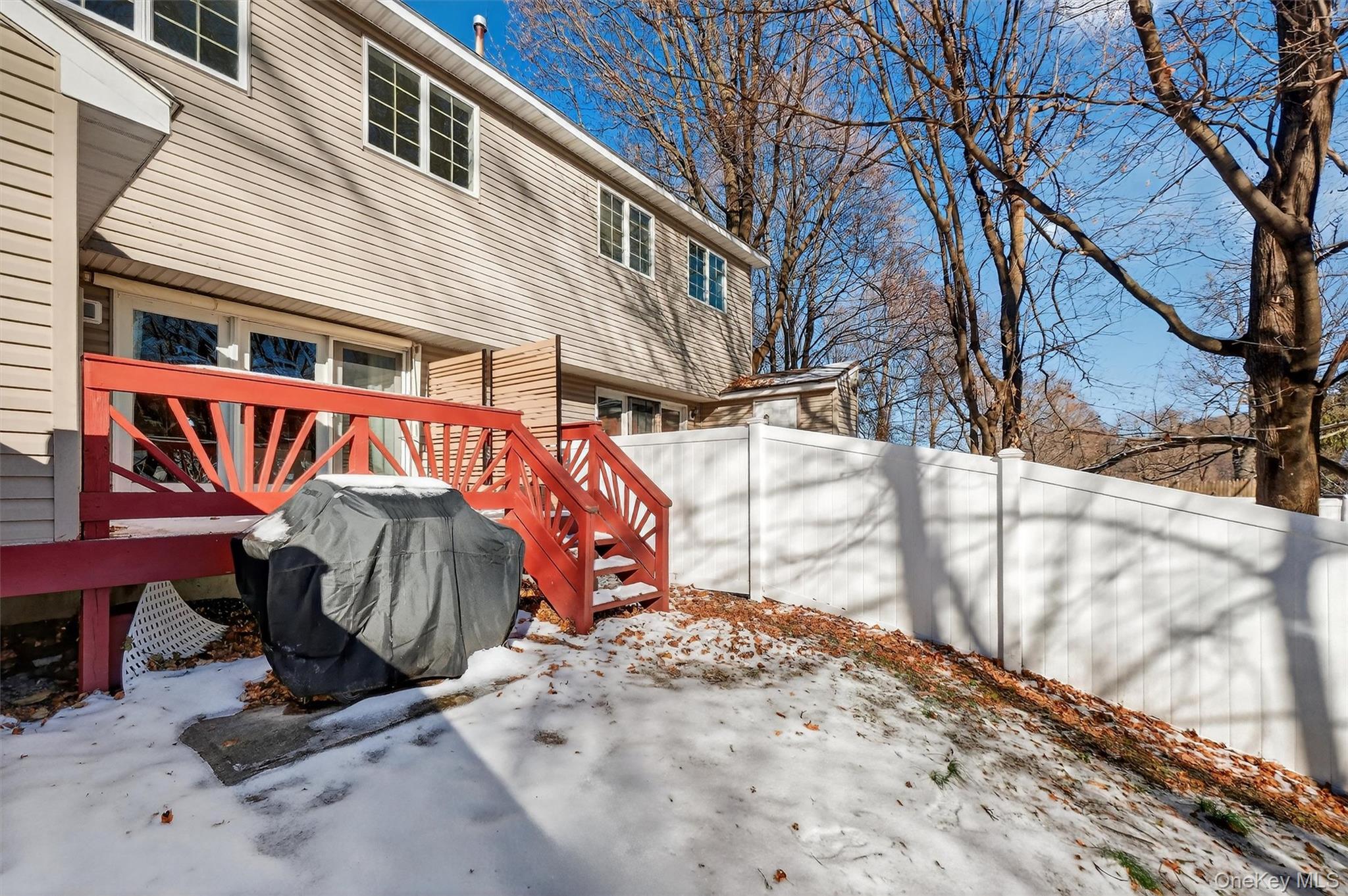 90 Roundtree Court Beacon, NY 12508 - Photo 35 of 39 a view of a house with a snow on the house