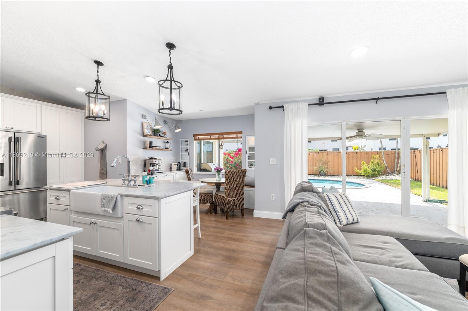 18217 Southwest 148th Ave Road Miami, FL 33187 - Photo 11 of 29 a very nice looking room with a large window