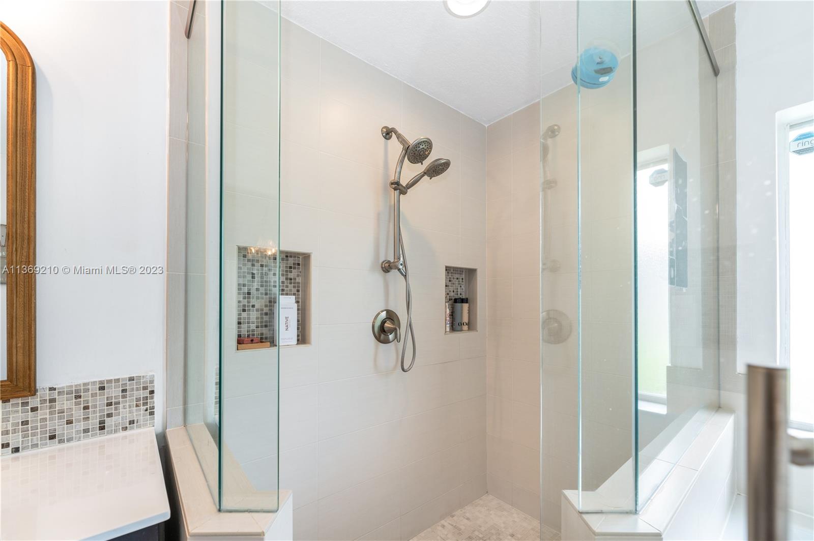 18217 Southwest 148th Ave Road Miami, FL 33187 - Photo 19 of 29 a bathroom with a shower and a sink