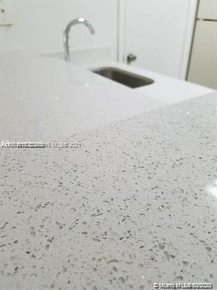 4581 West McNab Road, Unit 14 Pompano Beach, FL 33069 - Photo 4 of 10 a close view of a sink in a bathroom