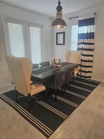 a workspace with furniture and window