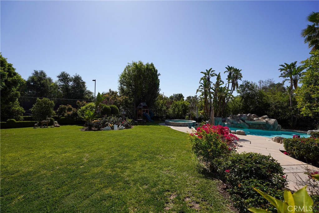 894 Fallen Leaf Road Arcadia, CA 91006 - Photo 22 of 28 a view of a large trees with a garden