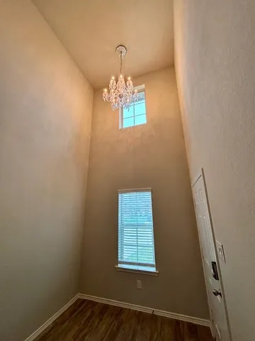 a kitchen with stainless steel appliances kitchen island granite countertop a stove a sink and a microwave