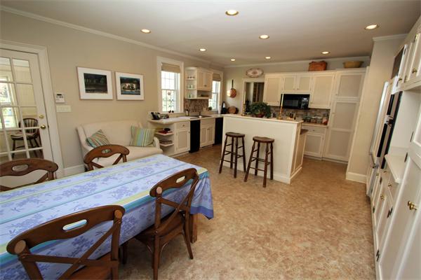 1 Channing Road Dedham, MA 02026 - Photo 13 of 22 a living room with stainless steel appliances furniture and a dining table with kitchen view