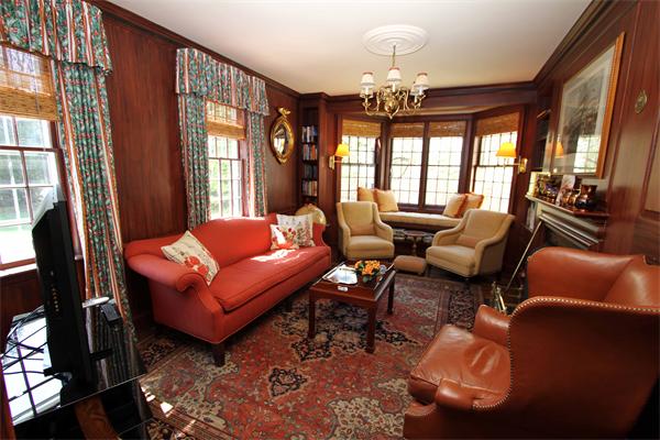 1 Channing Road Dedham, MA 02026 - Photo 14 of 22 a living room with furniture a chandelier and a chandelier