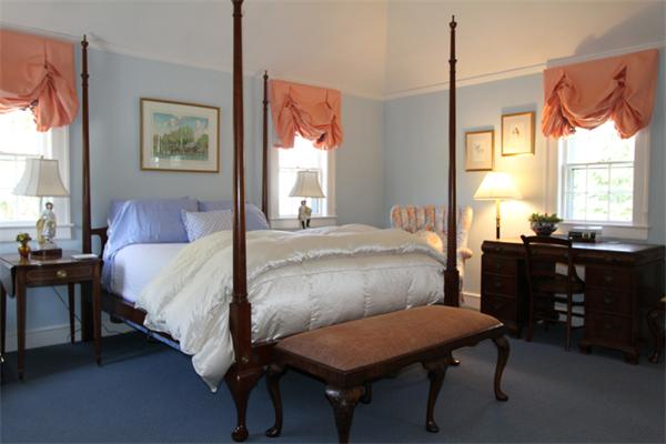 1 Channing Road Dedham, MA 02026 - Photo 18 of 22 a bedroom with a bed table chair and a window
