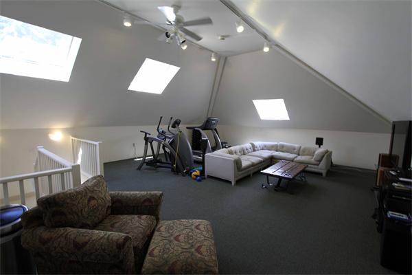 1 Channing Road Dedham, MA 02026 - Photo 22 of 22 a living room with furniture and a chandelier