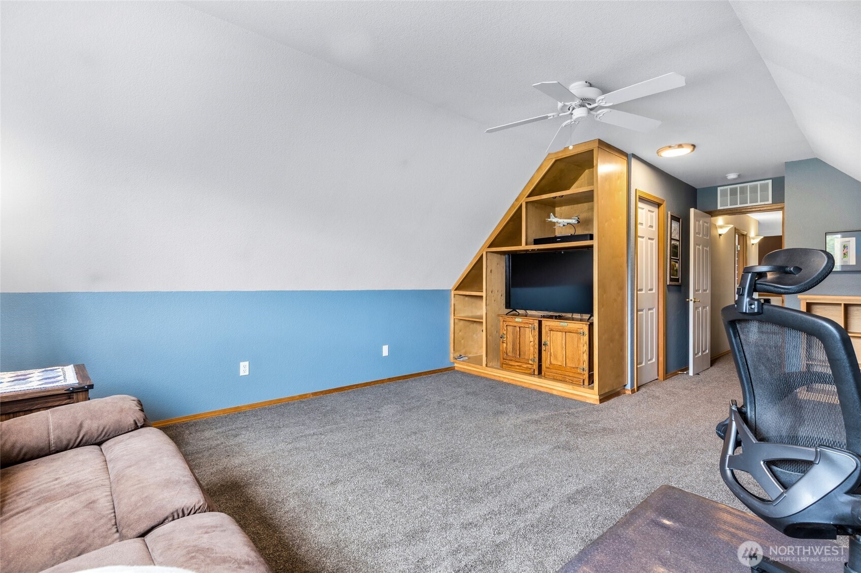 14419 Martinson Road Southeast Yelm, WA 98597 - Photo 26 of 39 a living room with furniture
