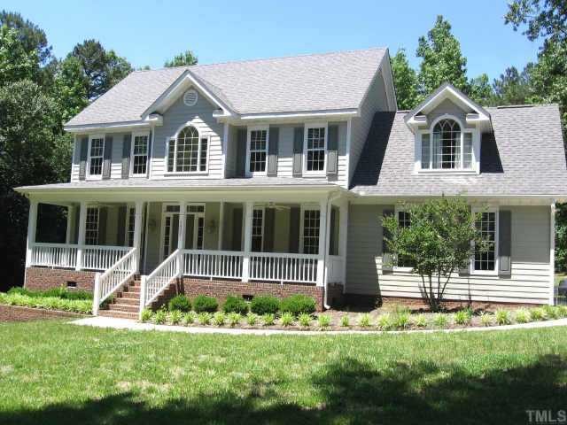 1932 Hilltop Road Raleigh, NC 27610 - Photo 1 of 1 WOW - TWO ACRES of privacy with just the right amount of grass & trees! Peaceful living at a reasonable price! Custom built with many features! Hardwood floors throughout most of first floor!
