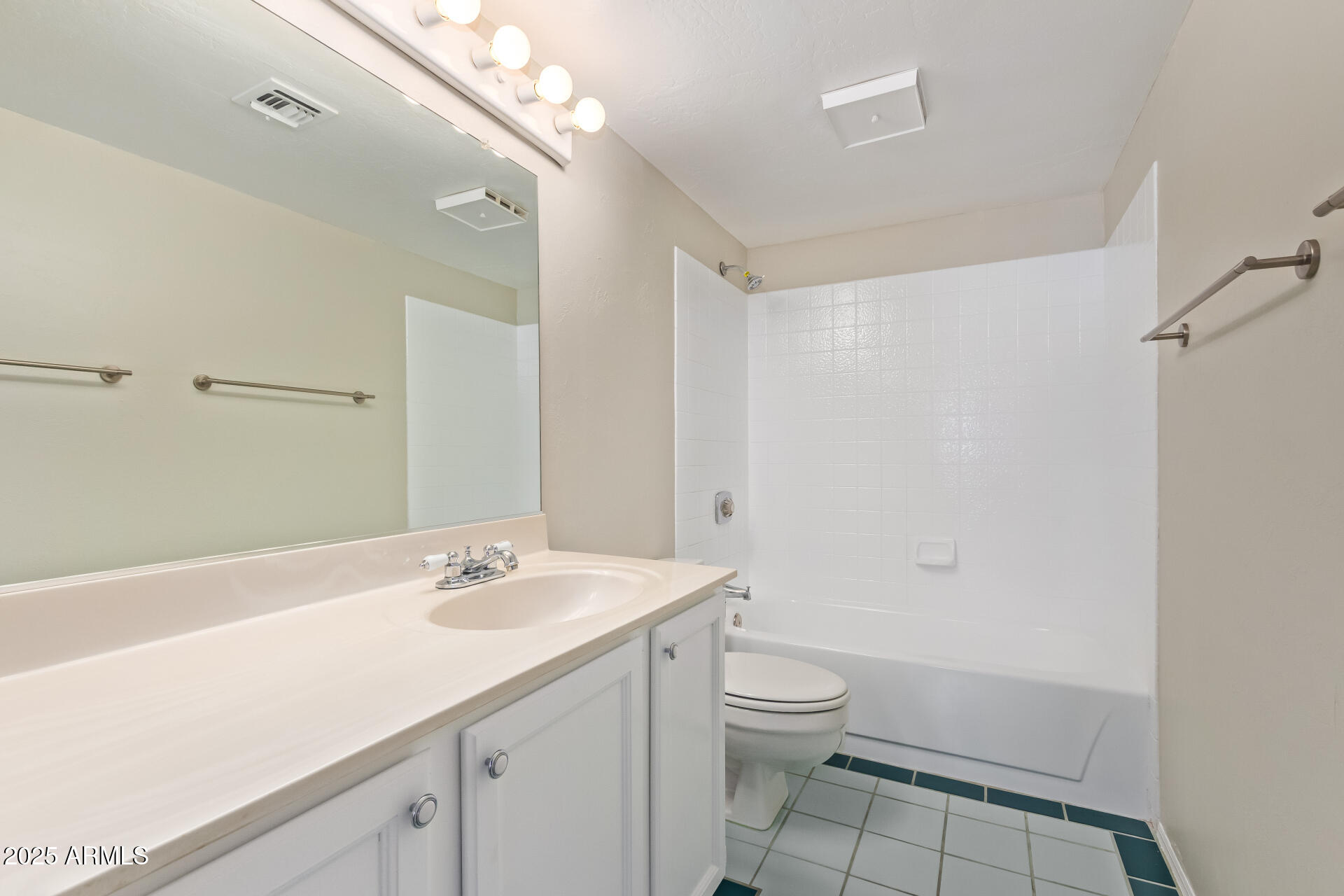 4328 North 36th Street, Unit 3 Phoenix, AZ 85018 - Photo 8 of 15 a bathroom with a sink a toilet and shower