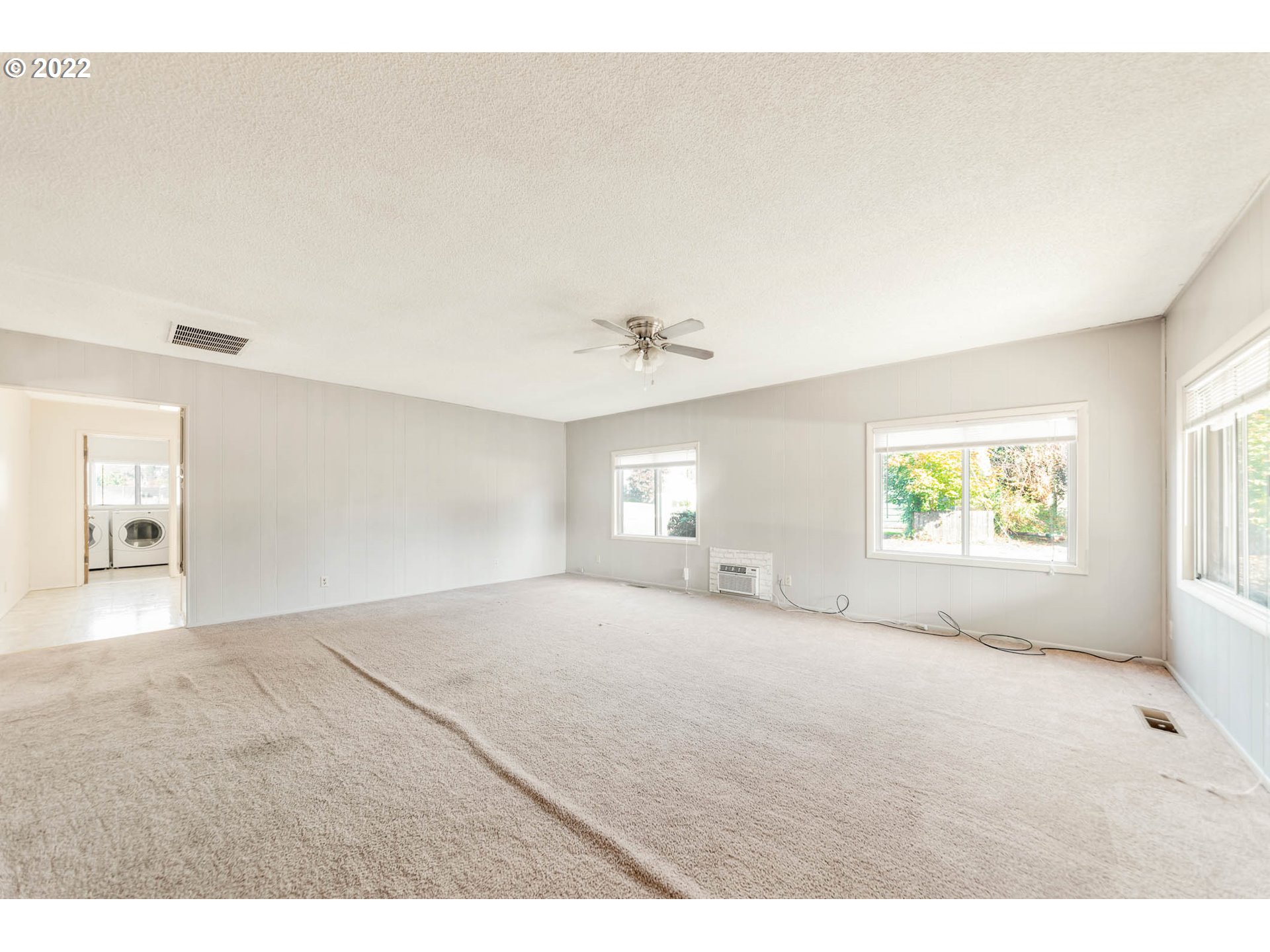 4361 Kalmia Street Springfield, OR 97478 - Photo 3 of 12 a view of an empty room with a window