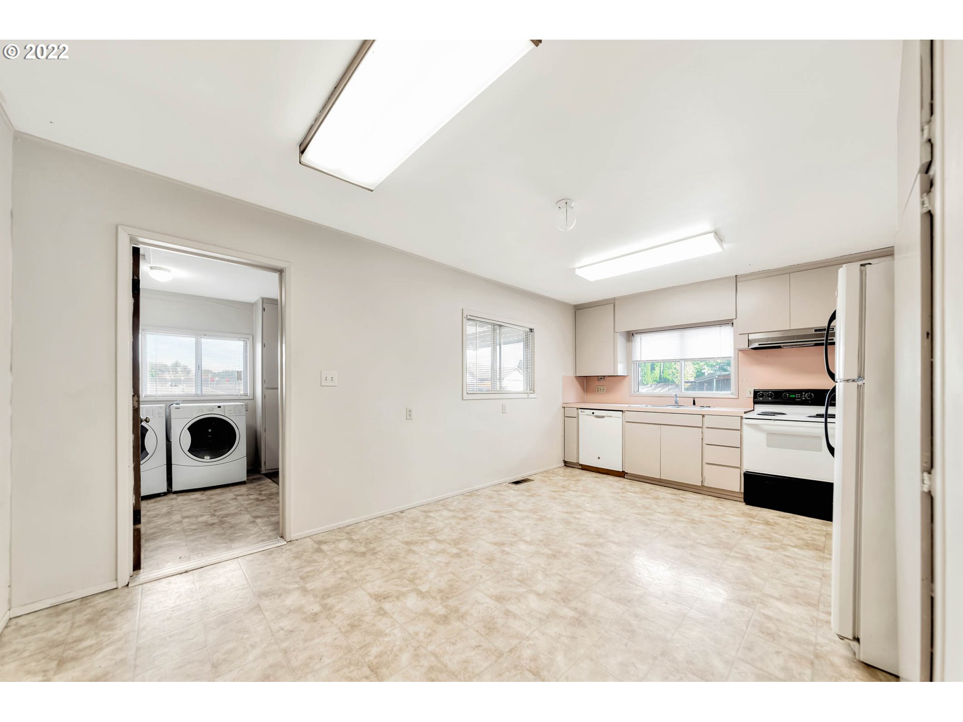 4361 Kalmia Street Springfield, OR 97478 - Photo 5 of 12 a kitchen with stainless steel appliances cabinets and a sink