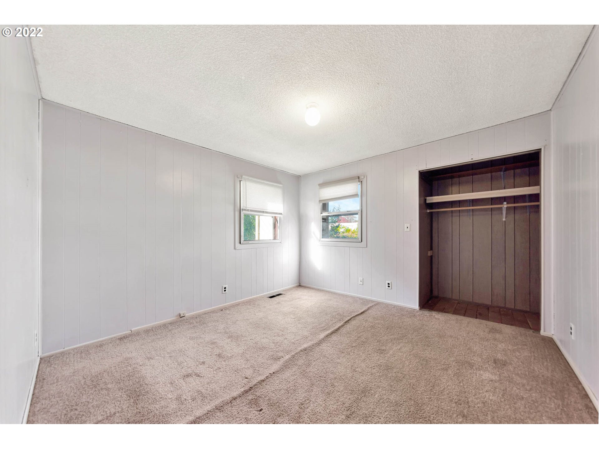 4361 Kalmia Street Springfield, OR 97478 - Photo 8 of 12 a view of an empty room and window