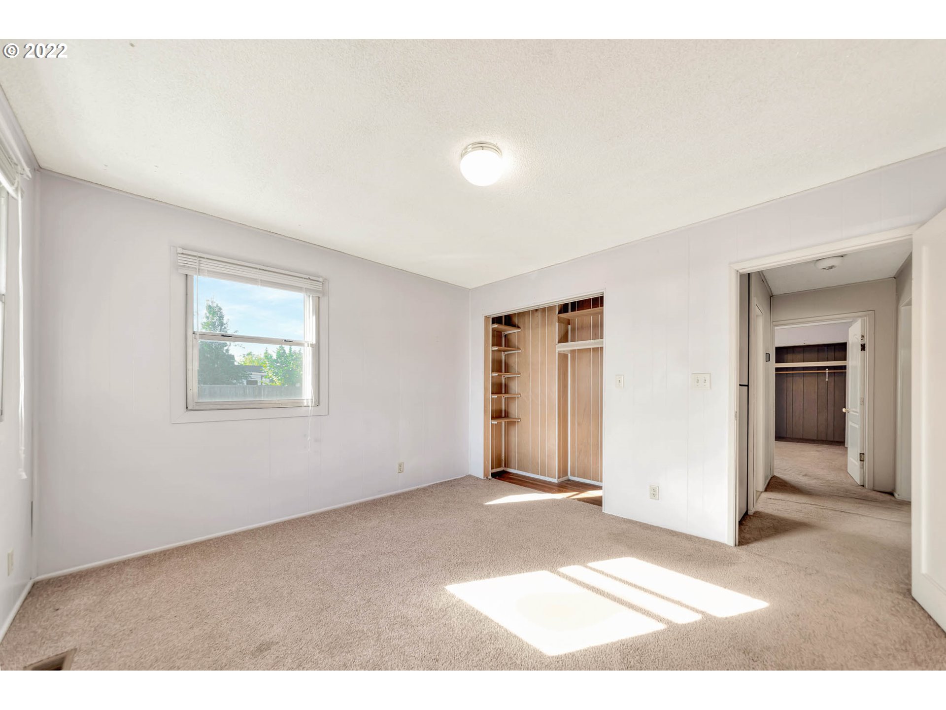 4361 Kalmia Street Springfield, OR 97478 - Photo 10 of 12 an empty room with windows and closet