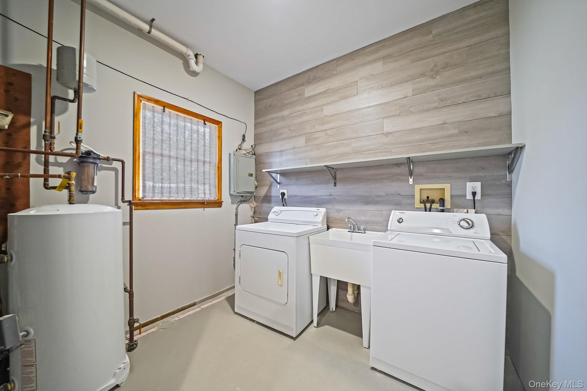 26 Bokel Road Ronkonkoma, NY 11779 - Photo 21 of 34 a utility room with dryer and washer