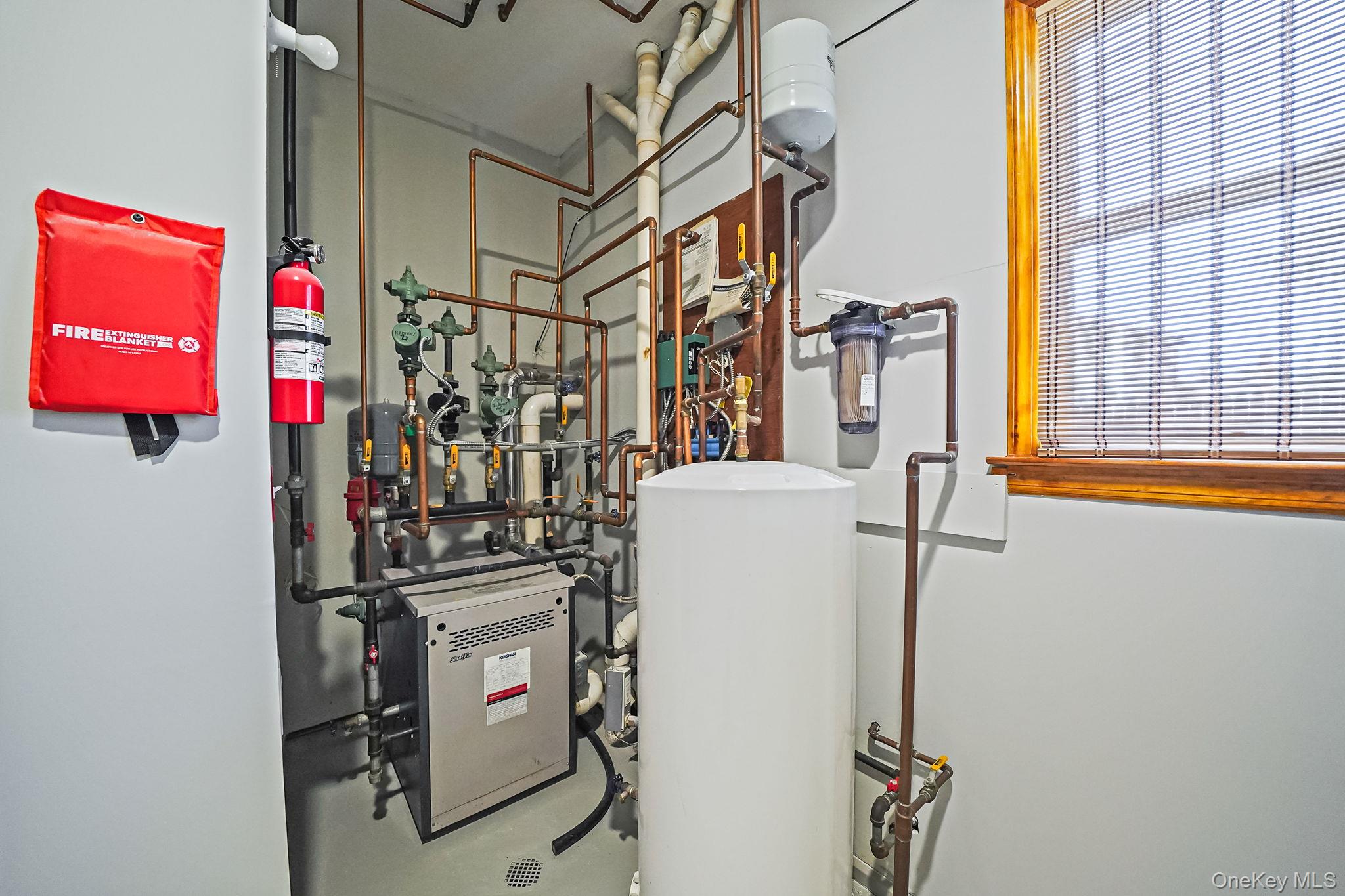 26 Bokel Road Ronkonkoma, NY 11779 - Photo 22 of 34 a utility room with dryer and washer