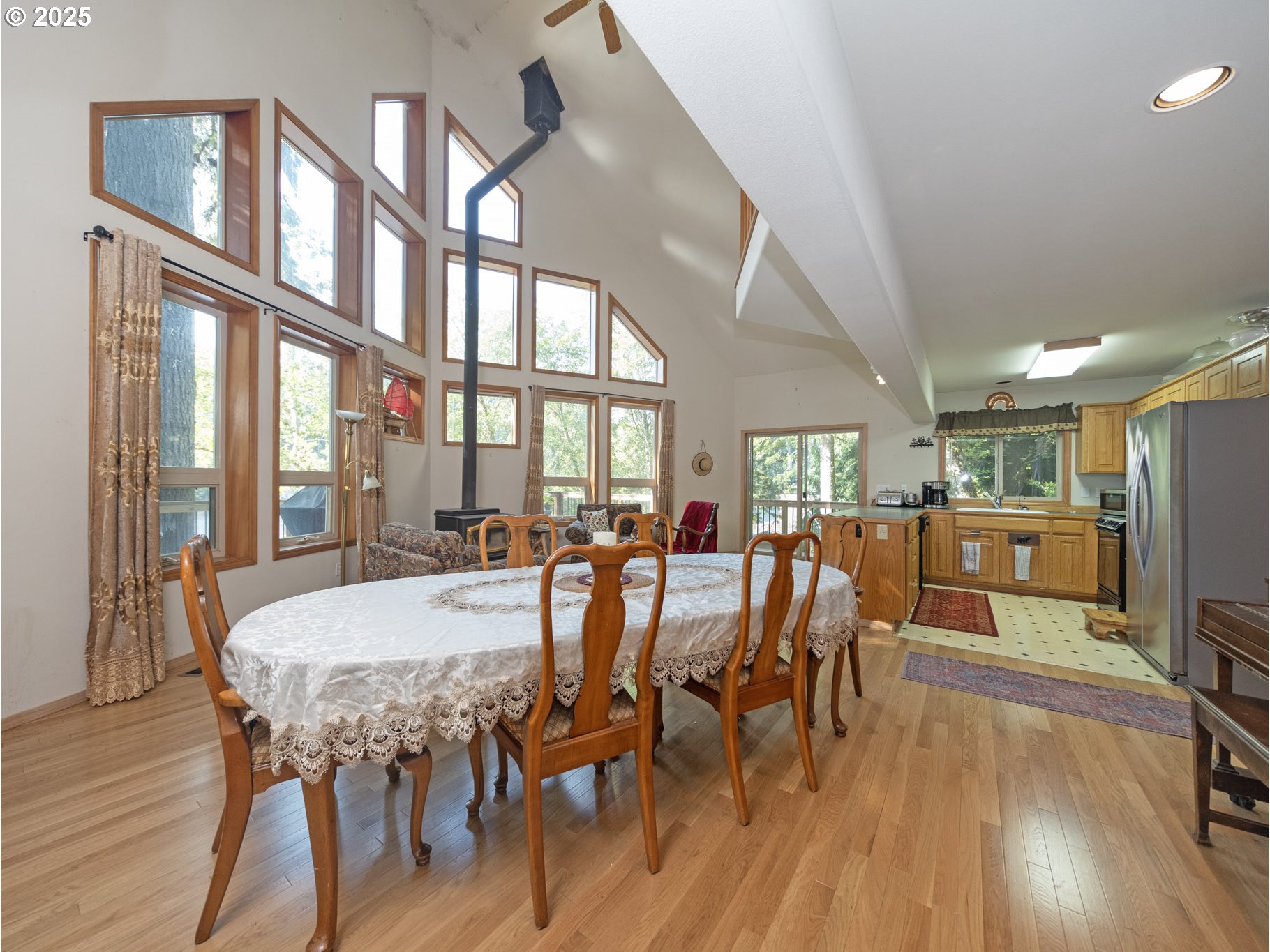 71397 Fishhawk Road Clatskanie, OR 97016 - Photo 17 of 48 a view of a dining room with furniture window and wooden floor