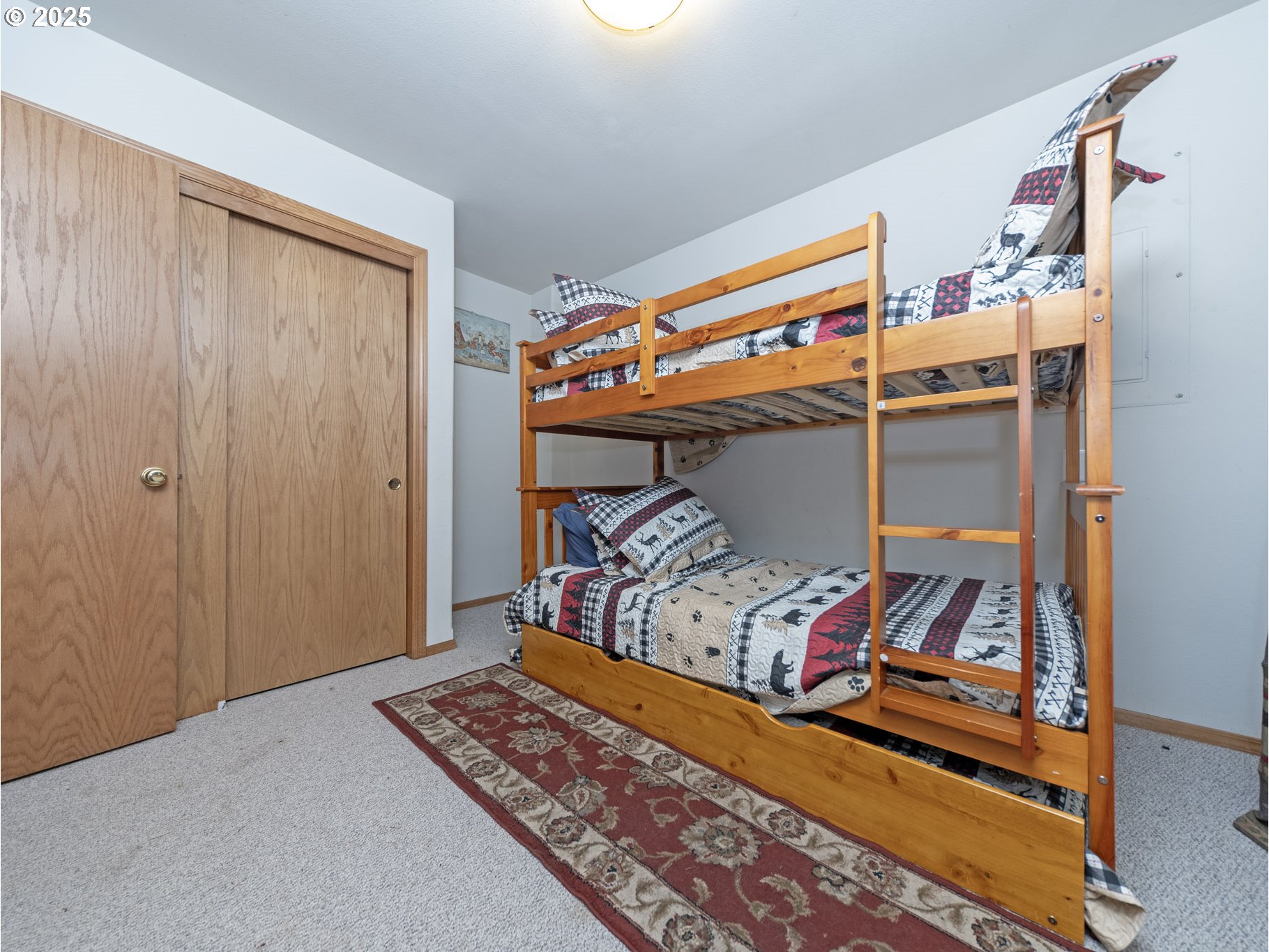 71397 Fishhawk Road Clatskanie, OR 97016 - Photo 19 of 48 a bedroom with a bed and a window