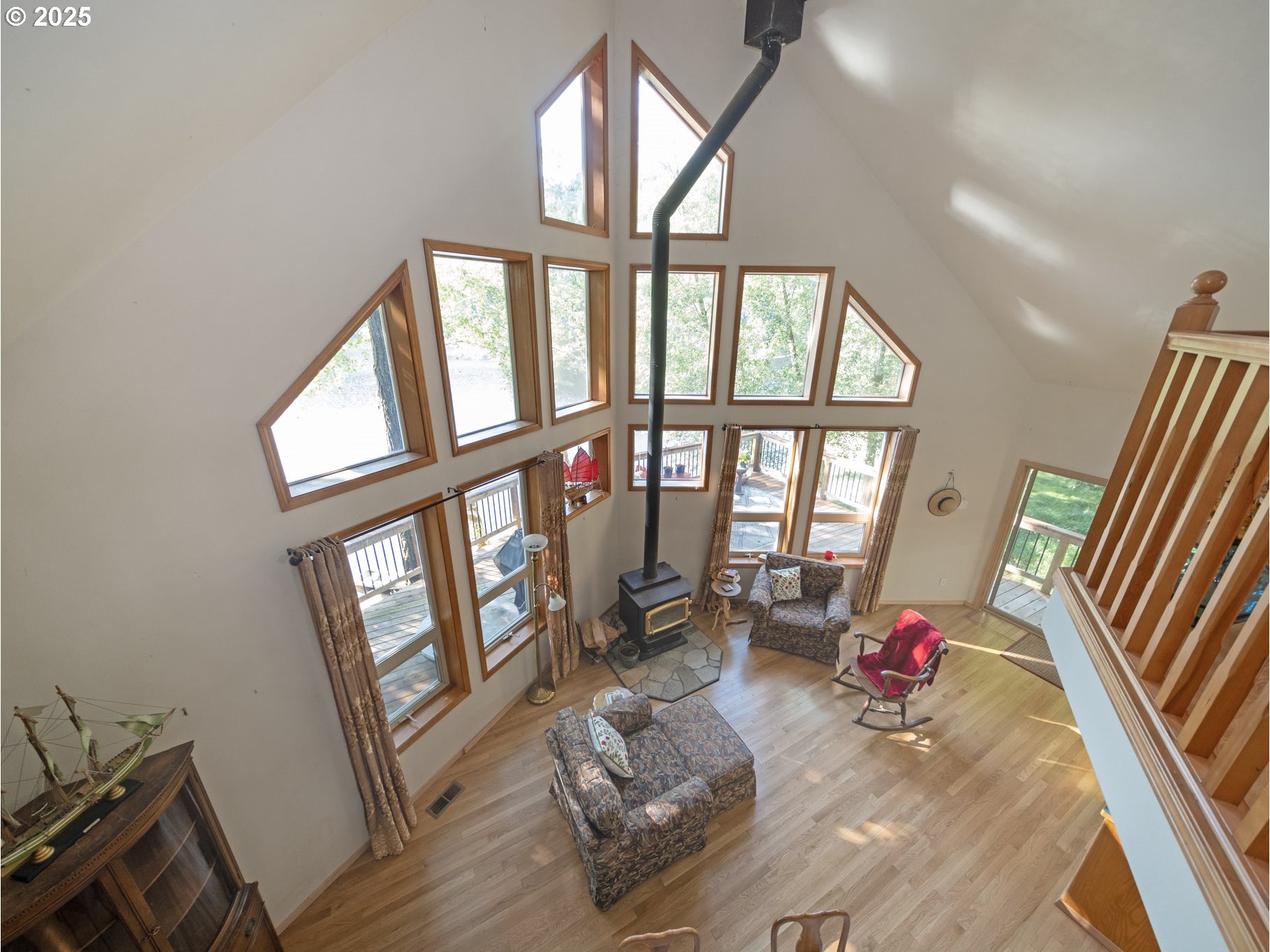 71397 Fishhawk Road Clatskanie, OR 97016 - Photo 24 of 48 a living room with furniture and a large window