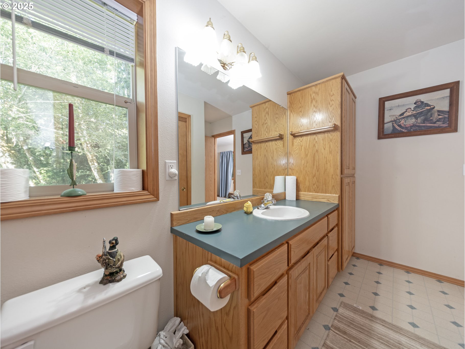 71397 Fishhawk Road Clatskanie, OR 97016 - Photo 29 of 48 a bathroom with a sink double vanity and a mirror