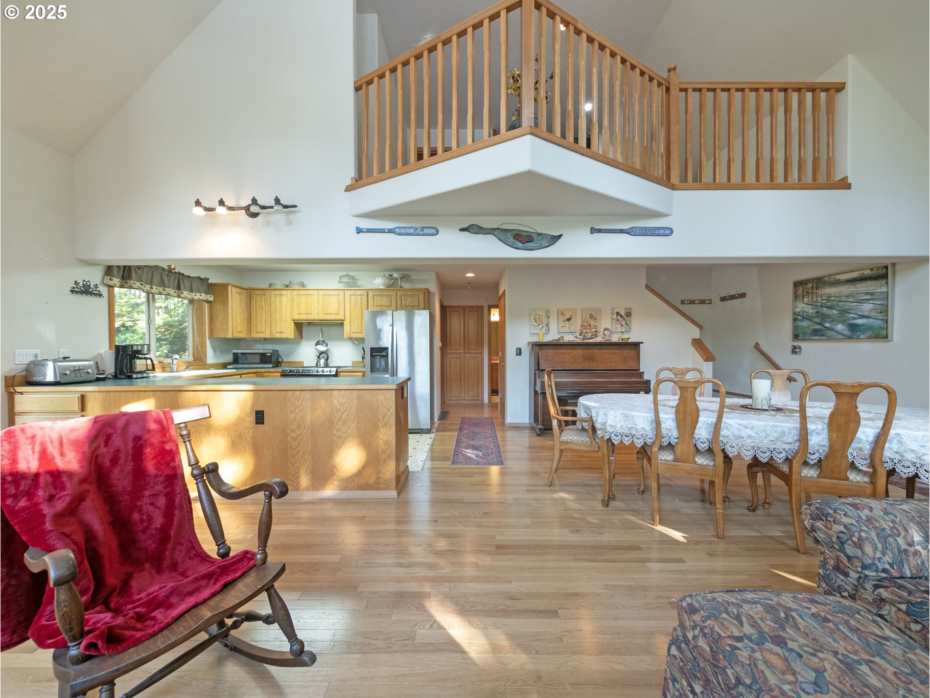 71397 Fishhawk Road Clatskanie, OR 97016 - Photo 32 of 48 a view of a dining room with furniture window and wooden floor