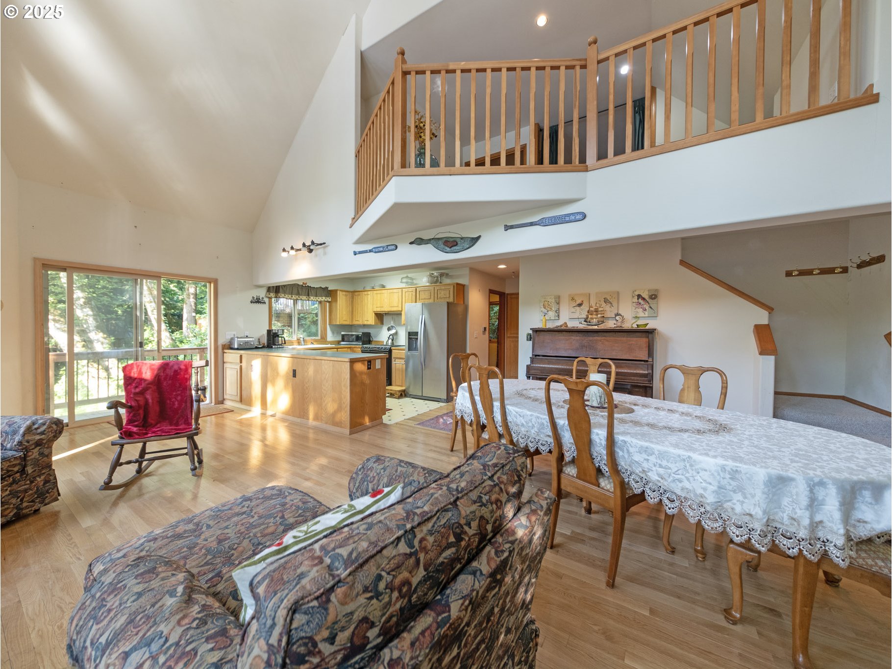 71397 Fishhawk Road Clatskanie, OR 97016 - Photo 34 of 48 a view of a dining room with furniture window and wooden floor