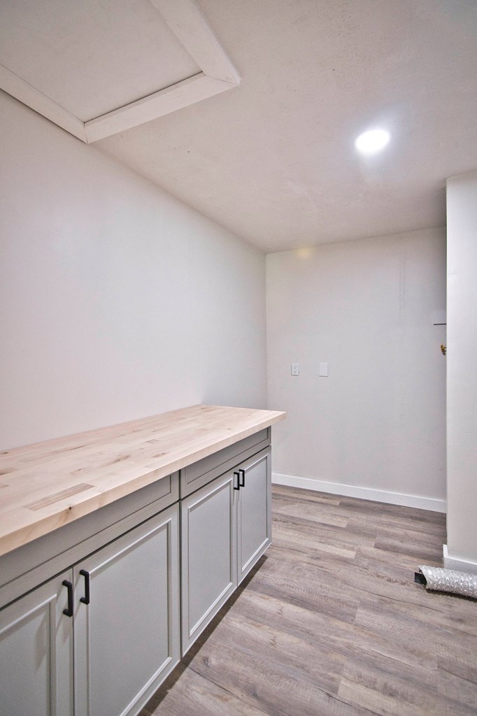 425 Post Hill Street Mason, TX 76856 - Photo 14 of 21 a view of cabinets and wooden floor