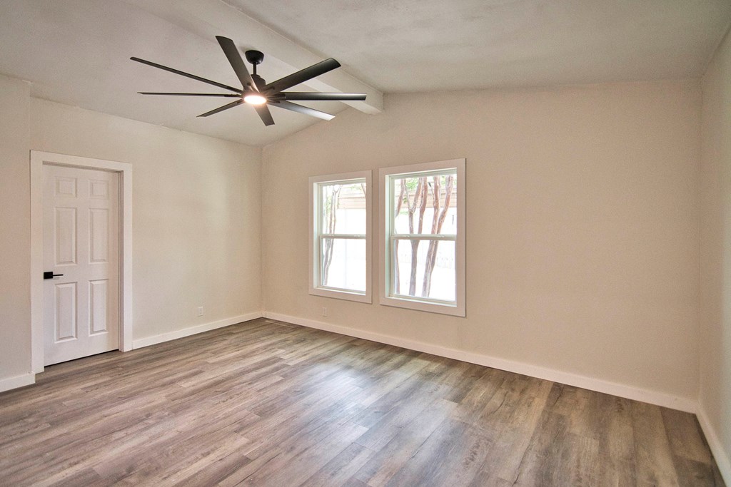 425 Post Hill Street Mason, TX 76856 - Photo 8 of 21 a view of empty room with wooden floor and fan