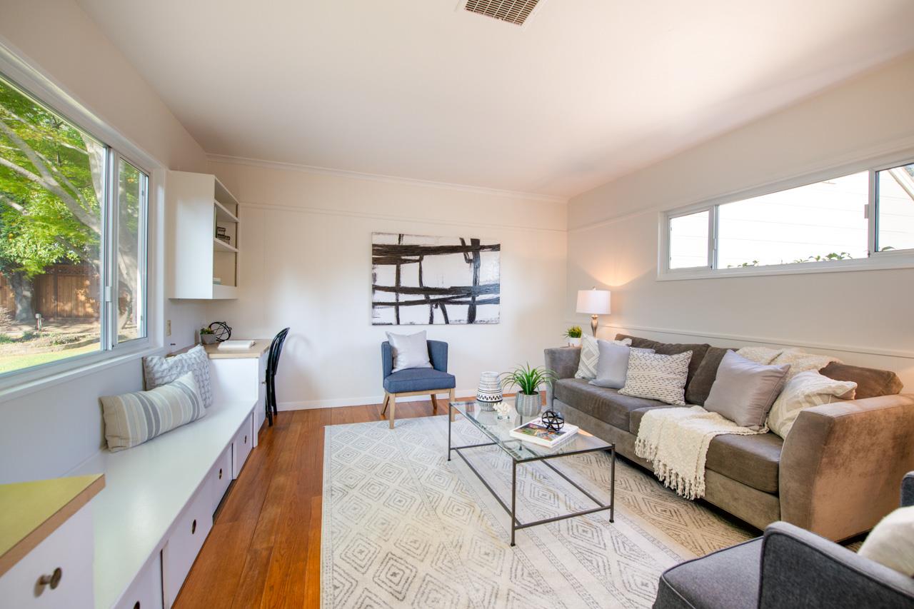 8 Oak Court Sunnyvale, CA 94086 - Photo 15 of 30 a living room with furniture and a large window