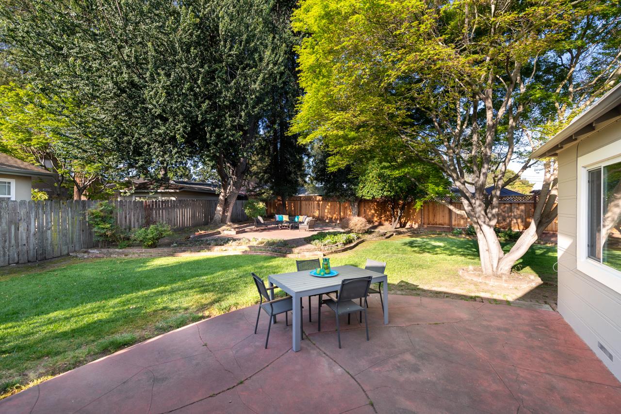 8 Oak Court Sunnyvale, CA 94086 - Photo 26 of 30 a view of a swimming pool with a table and chairs in a yard