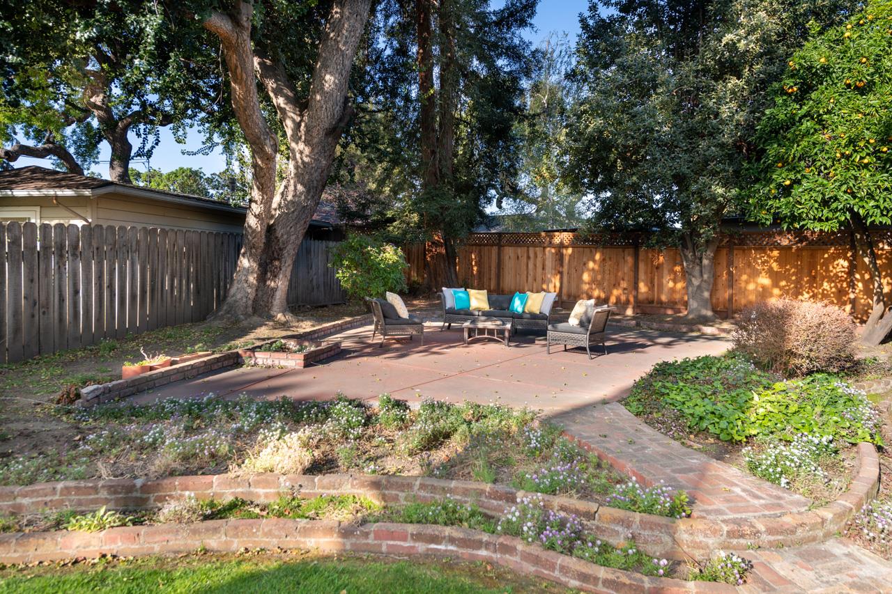 8 Oak Court Sunnyvale, CA 94086 - Photo 27 of 30 a view of swimming pool with a patio and a yard