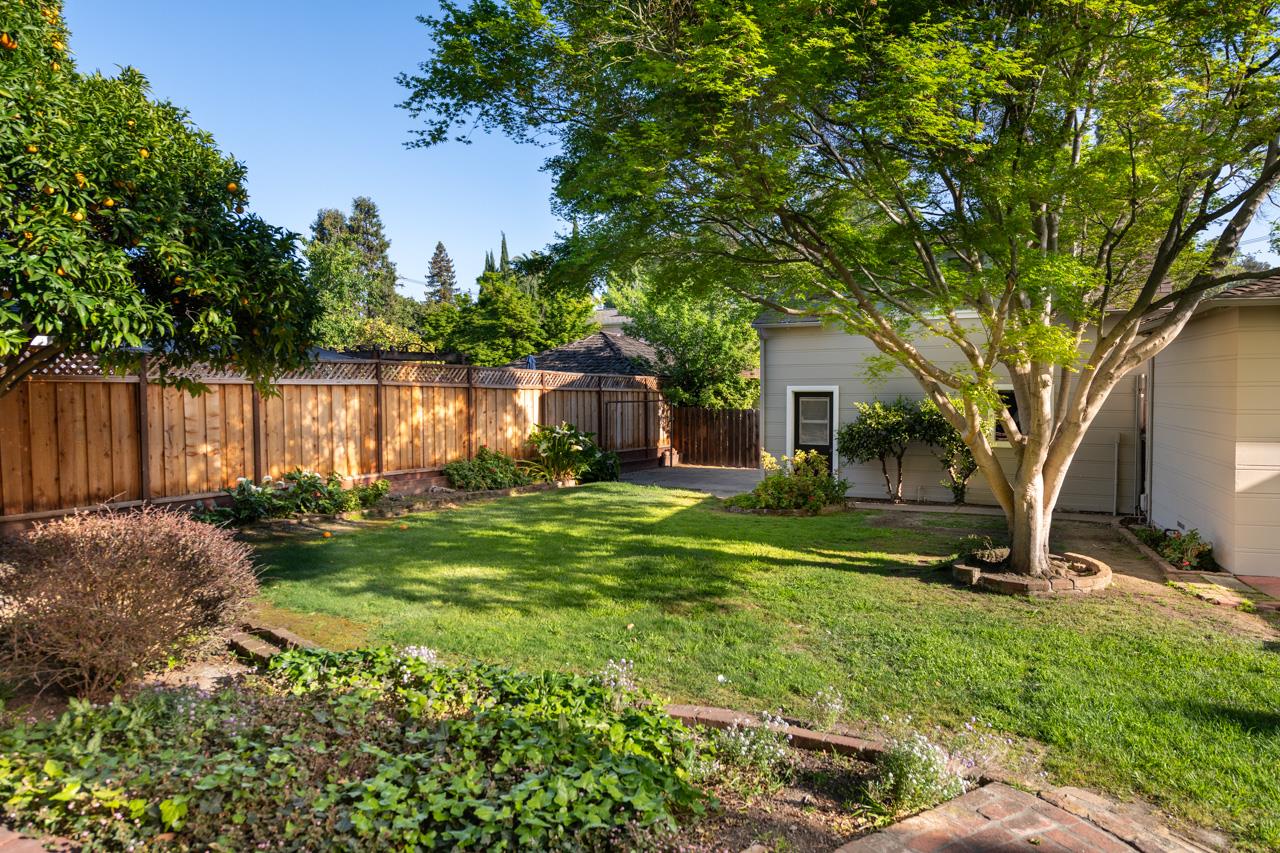 8 Oak Court Sunnyvale, CA 94086 - Photo 28 of 30 a view of backyard of house with outdoor seating and green space