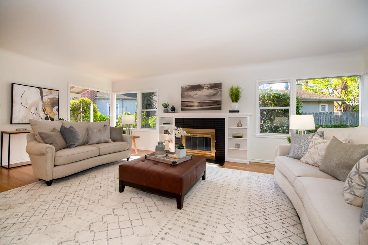 8 Oak Court Sunnyvale, CA 94086 - Photo 7 of 30 a living room with furniture and a fireplace