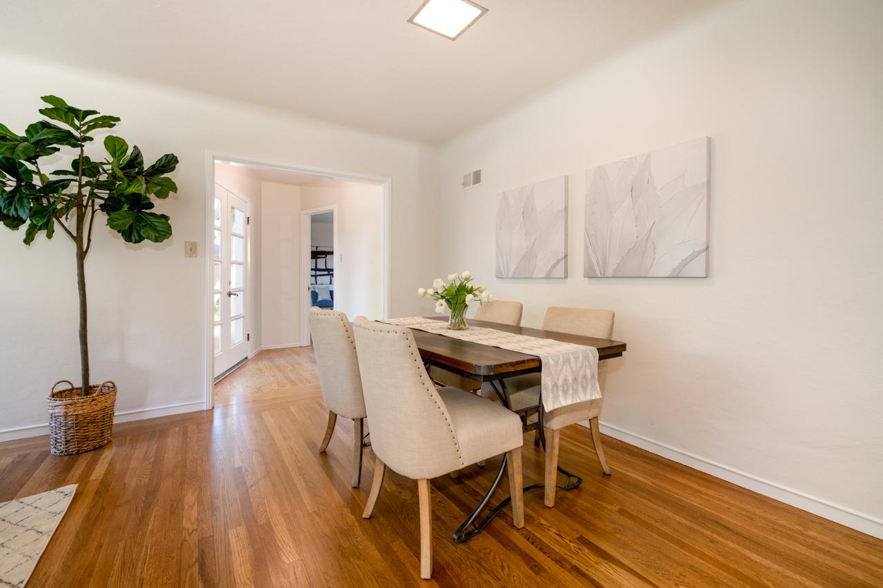 8 Oak Court Sunnyvale, CA 94086 - Photo 9 of 30 a view of a dining room with furniture and a potted plant