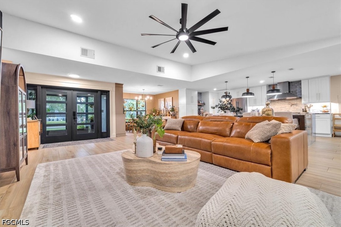 202 Ridgewood Avenue Clewiston, FL 33440 - Photo 20 of 50 a living room with furniture and a large window