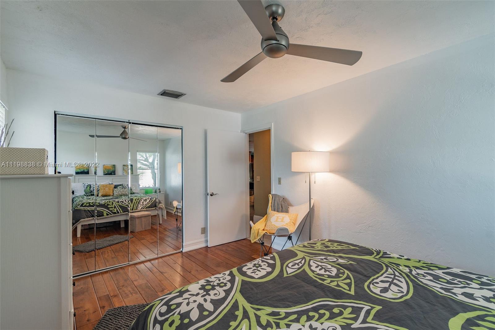 3015 Dunlin Road Delray Beach, FL 33444 - Photo 24 of 47 a living room with furniture and a table