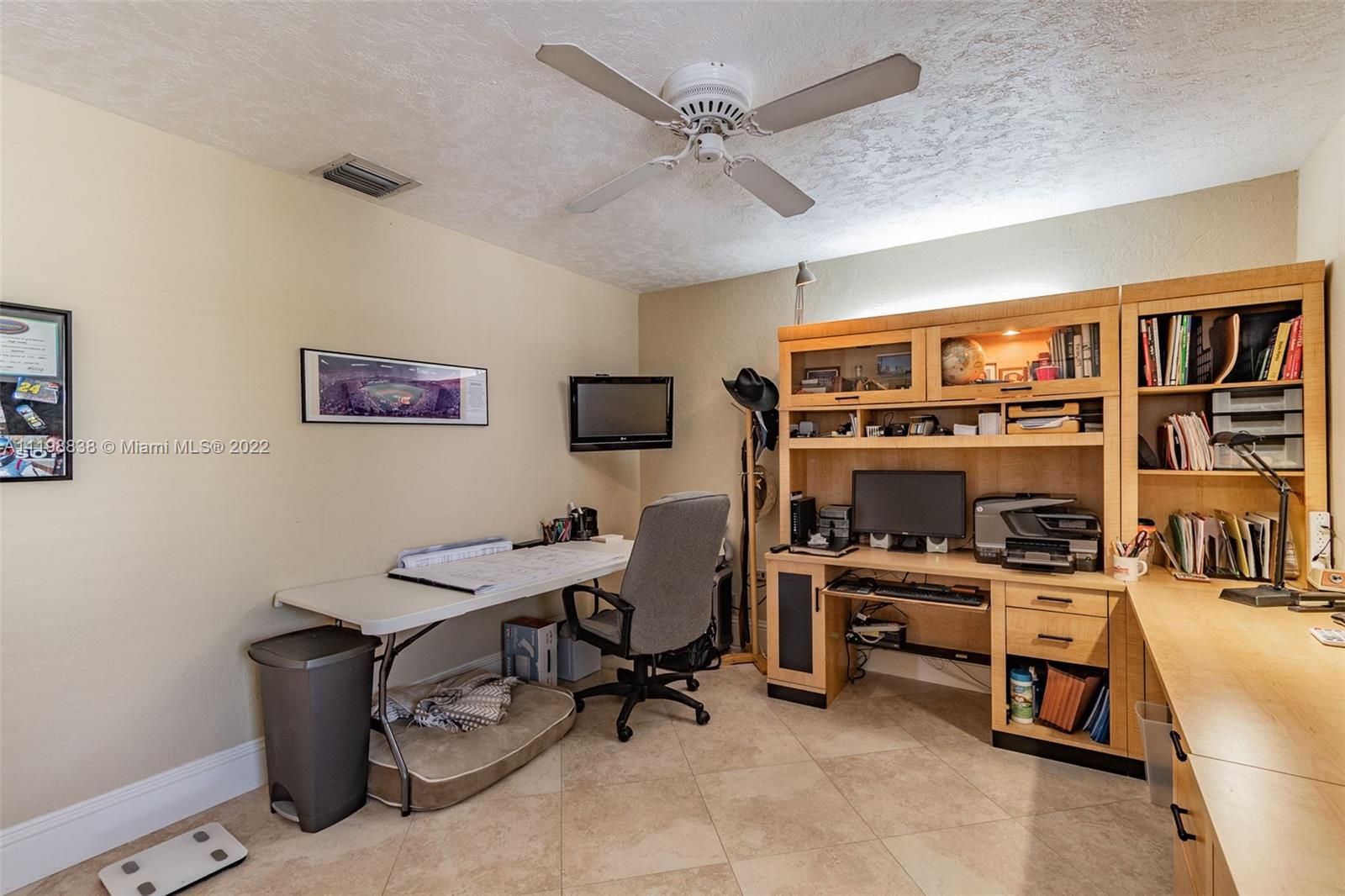 3015 Dunlin Road Delray Beach, FL 33444 - Photo 28 of 47 a view of a workspace with furniture