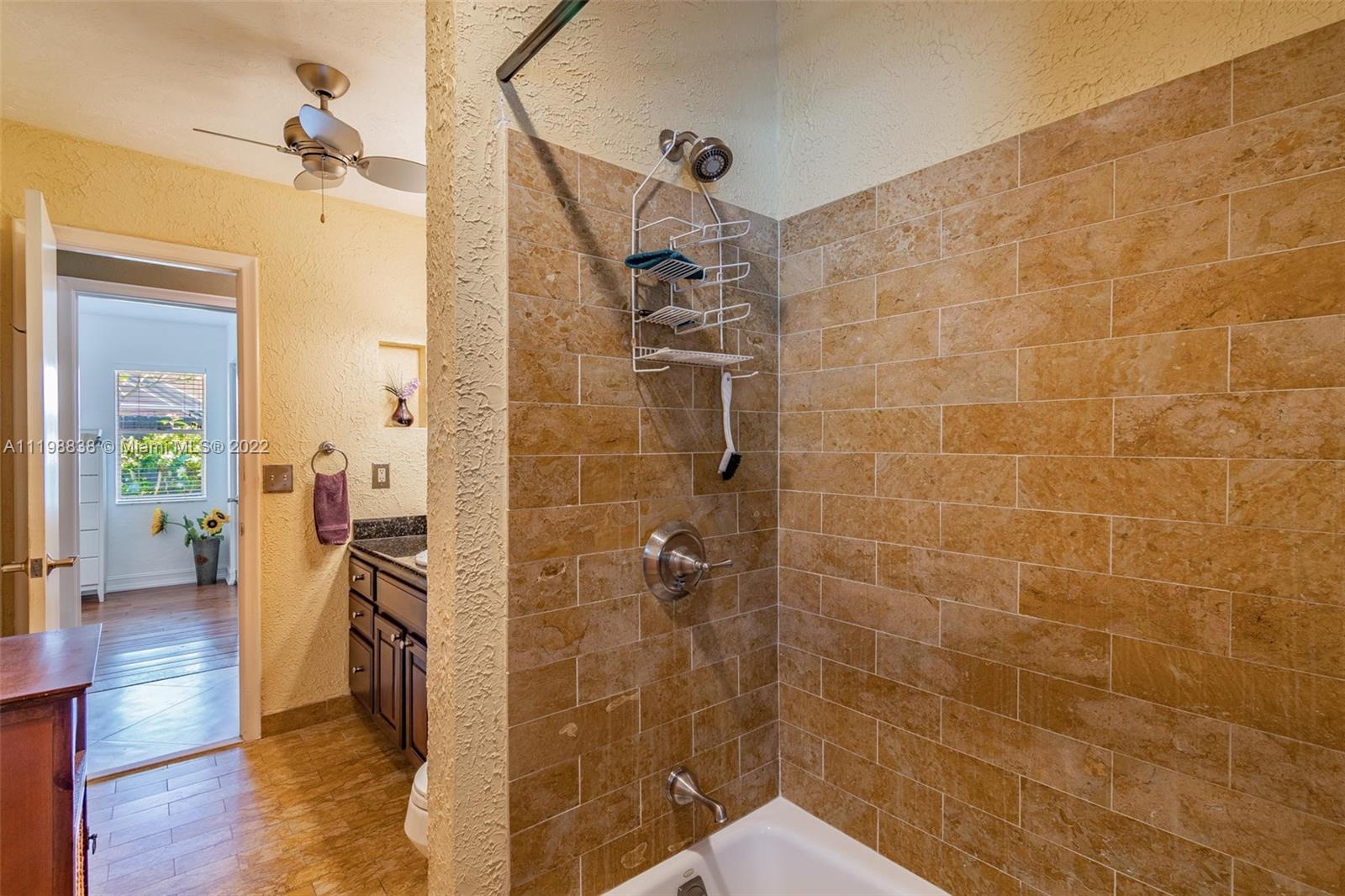 3015 Dunlin Road Delray Beach, FL 33444 - Photo 30 of 47 a bathroom with a shower