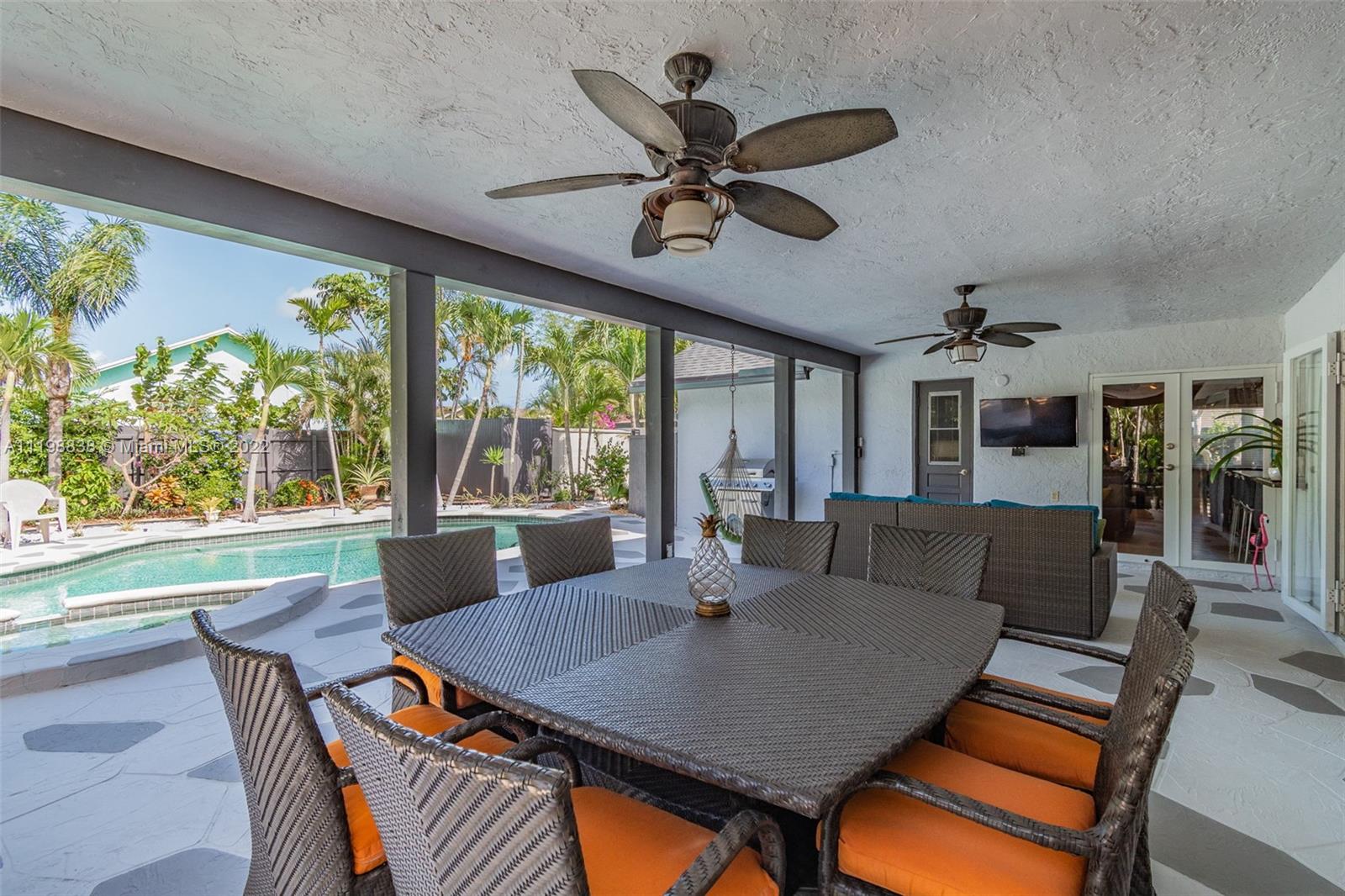 3015 Dunlin Road Delray Beach, FL 33444 - Photo 37 of 47 a view of a dining room with furniture window and outside view