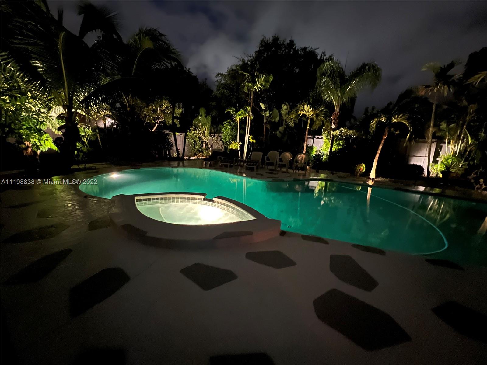 3015 Dunlin Road Delray Beach, FL 33444 - Photo 46 of 47 a view of swimming pool from a outdoor space