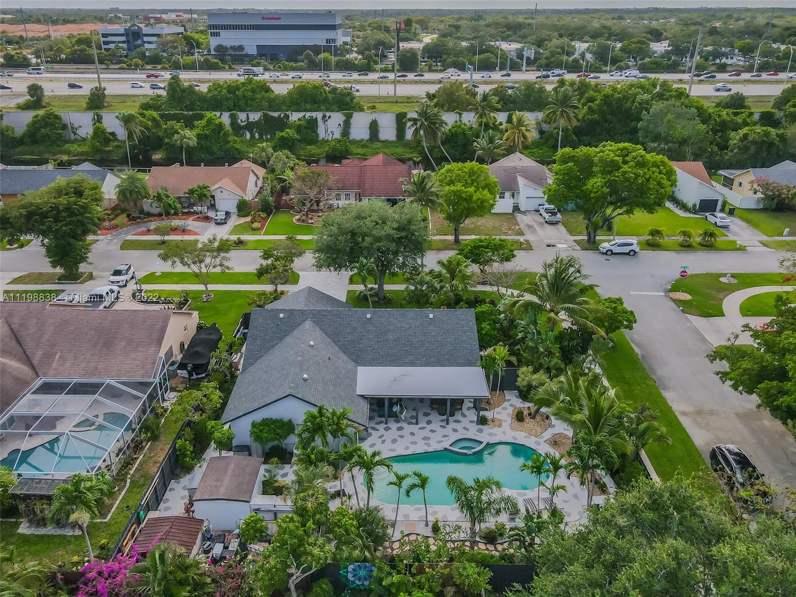 3015 Dunlin Road Delray Beach, FL 33444 - Photo 8 of 47 an aerial view of multiple house