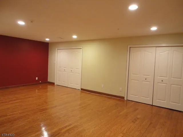 a view of a house with a yard and a garden