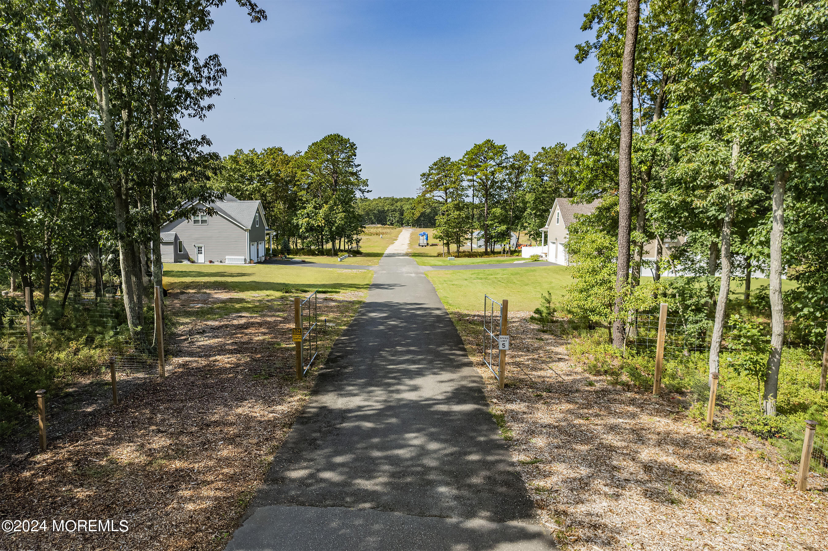 503 Newtons Corner Road Howell, NJ 07731 - Photo 2 of 53 a view of a yard with a table and chairs