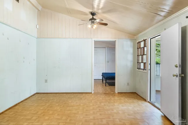 a view of front door and bedroom