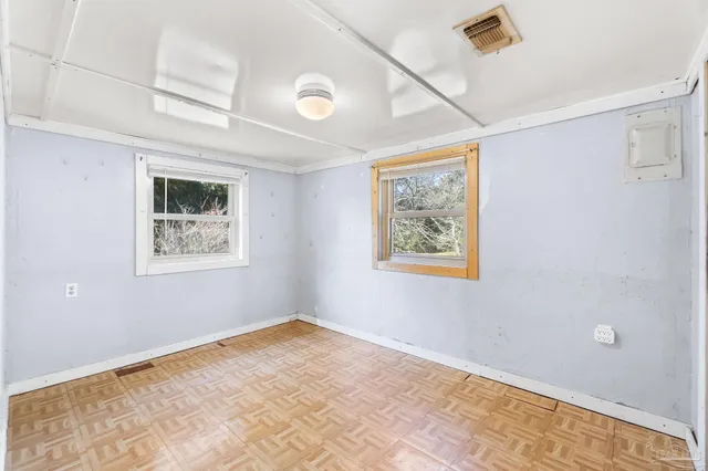 an empty room with windows