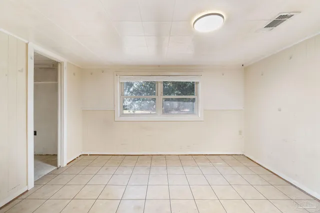 a view of an empty room with window