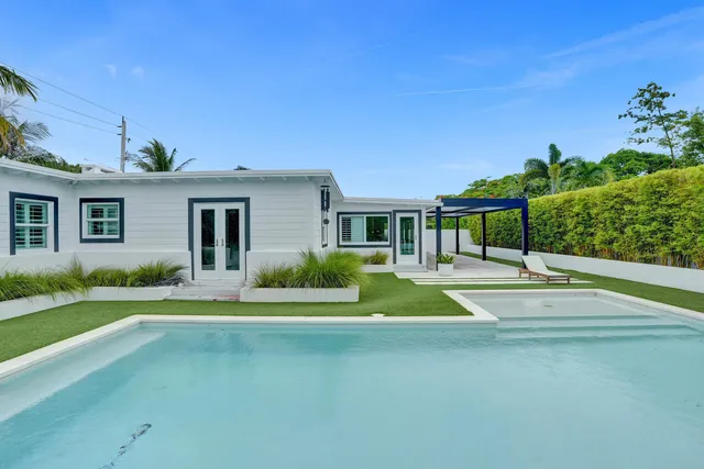 a view of house with outdoor space and porch