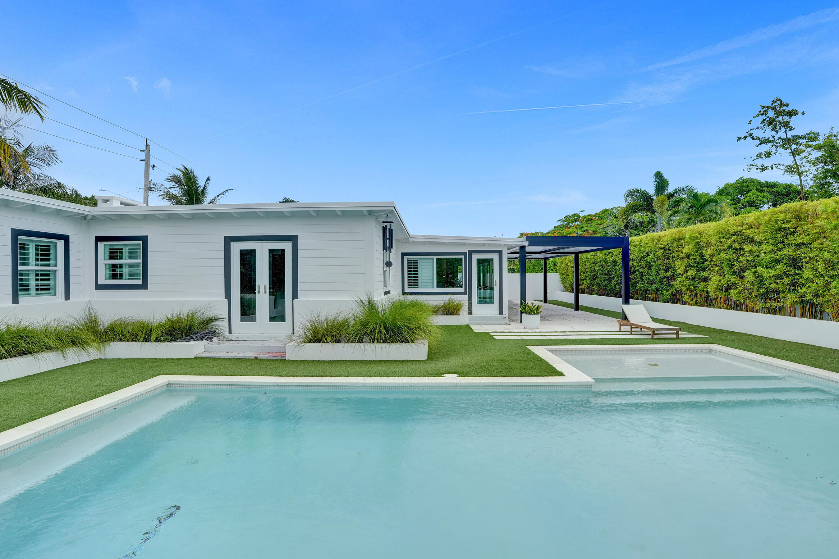 a view of house with outdoor space and porch