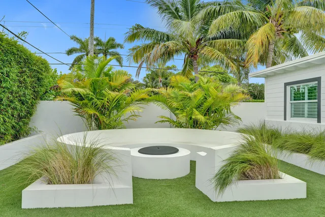 a view of a vase of flowers sitting on a table